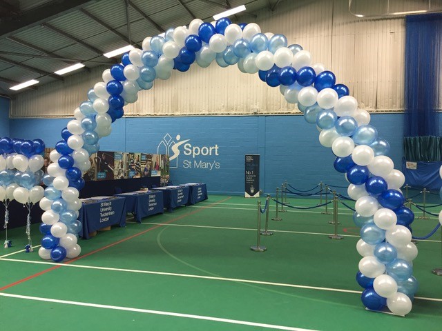 blues and white arch in sports hall